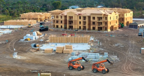RVs parked on a construction or work site